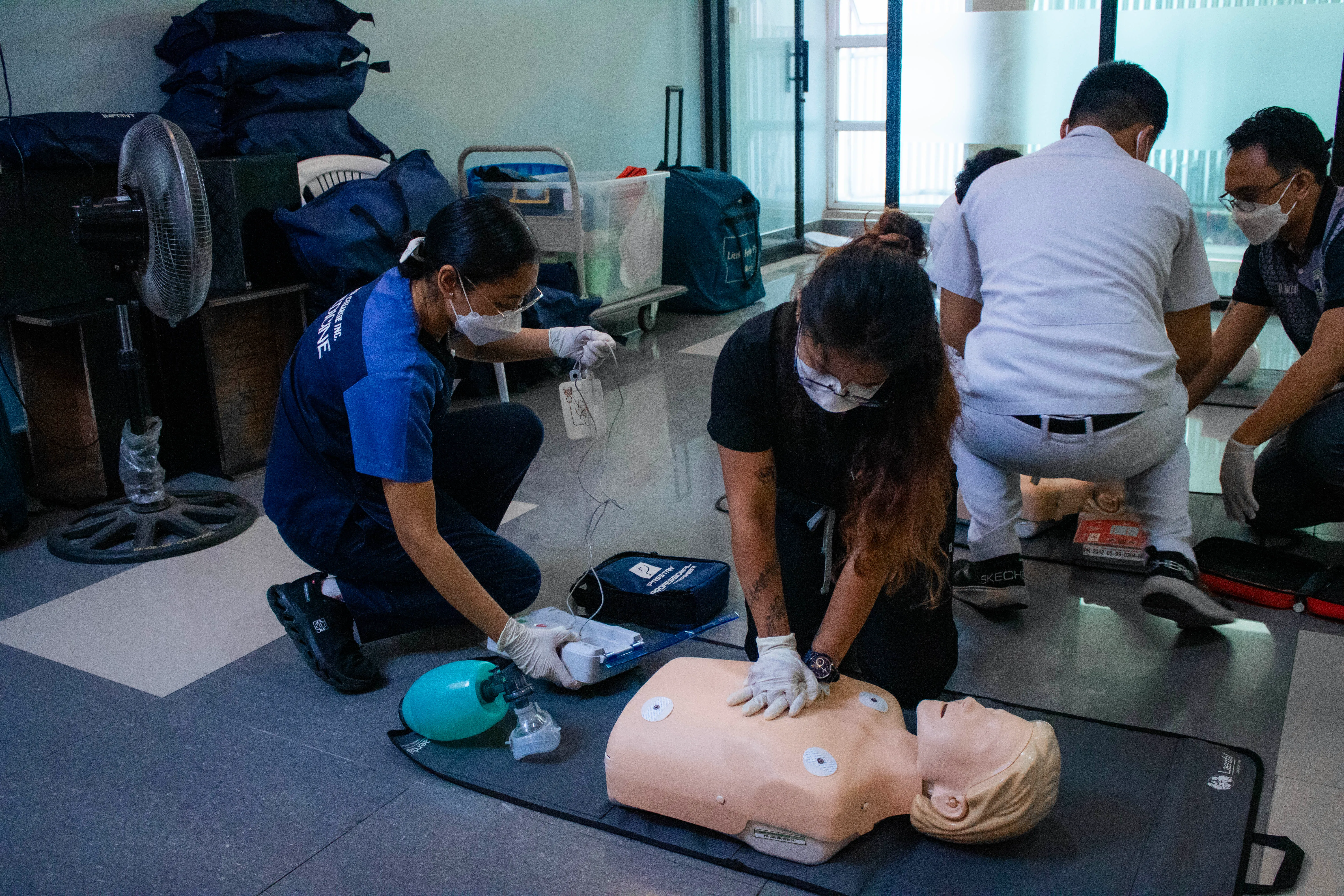 Medical students undergoing Advanced Cardiovascular Life Support (ACLS) hands-on training